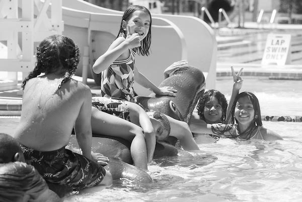 Kids enjoying the fun at Ellen E. Linson Splash Park in College Park.