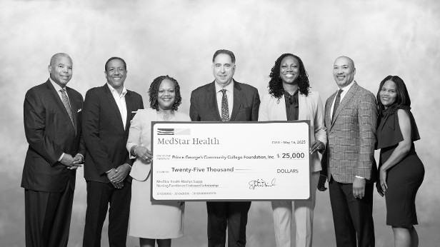 The check presentation and co-naming were held at PGCC, where representatives from MedStar Health, the Powell family, and College leadership gathered to celebrate the gift, new co-branding, and the impact of Suggs’ legacy. The check presentation and co-naming were held at PGCC, where representatives from MedStar Health, the Powell family, and College leadership gathered to celebrate the gift, new co-branding, and the impact of Suggs’ legacy.