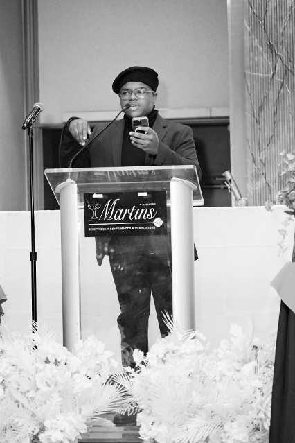 Photo courtesy Top Ladies of Distinction, Inc. Prince George’s County Chapter Jason P. Dacanay performs his poem We Are Still Standing at the 14th Annual Dr. Martin Luther King, Jr. Prayer Breakfast hosted by the Top Ladies of Distinction, Inc. Prince George’s County Chapter held on Saturday, January 17, 2026 at Martin’s Crosswinds in Greenbelt.