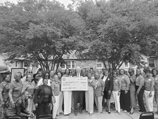 Photo courtesy The Ivy Community Charities of Prince George’s County, Inc. Maryland Senator Chris Van Hollen presenting the $2M check to The Ivy Community Charities of Prince George’s County Board, Staff, and Supporters.